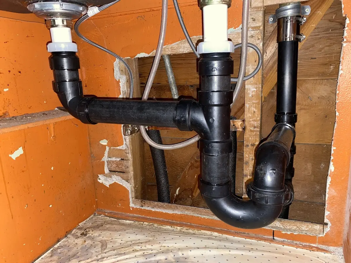 Professional Garbage Disposal Repair equipment and tools on the job in Roanoke Rapids